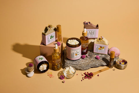 Collection of skincare and wellness products on a beige background